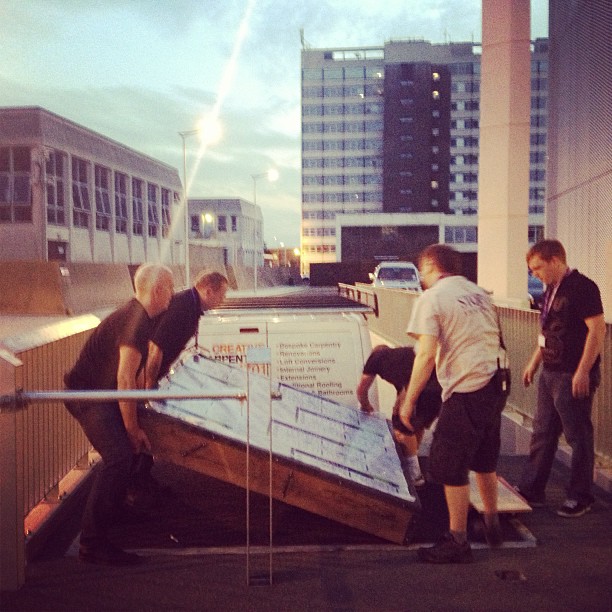 The  lads helping me to get the beastly thing through the rear stage door at Cast